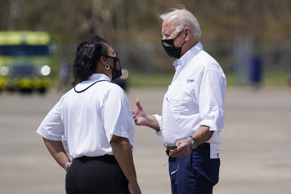 President Joe Biden talks with New Orleans Mayor LaToya Cantrell as he arrives at Louis Armstrong New Orleans International Airport in Kenner, La., Friday, Sept. 3, 2021, to tour damage caused by Hurricane Ida. (AP Photo/Evan Vucci)