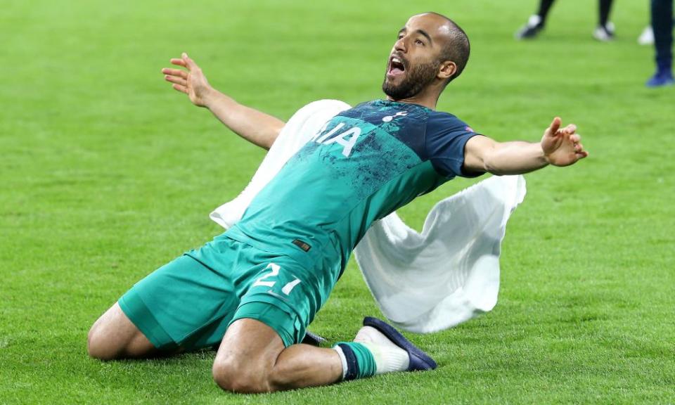 Lucas Moura slides to celebrate his team’s incredible victory.
