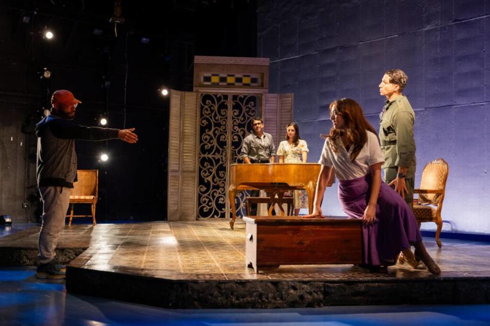 Playwright Nilo Cruz gives direction to actors Gabriell Salgado and Stephanie Machado (at piano), Thais Mendendez and Maurice Compte in Miami New Drama’s “Two Sisters and a Piano.”