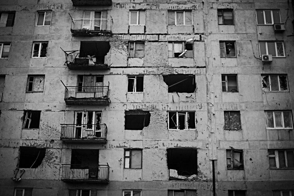 <p>Damaged buildings are seen at the frontline of Avdiivka, one of the hottest areas these days, near Donetsk, in April 2017. The biggest coke factory in Europe is here, so Avdiivka has been a frontline since 2014. (Photo: Manu Brabo/MeMo) </p>