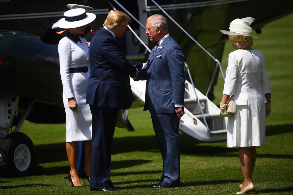 US President Donald Trump and First Lady Melania Trump are greeted by  Prince Charles and Camilla, Duchess of Cornwall 