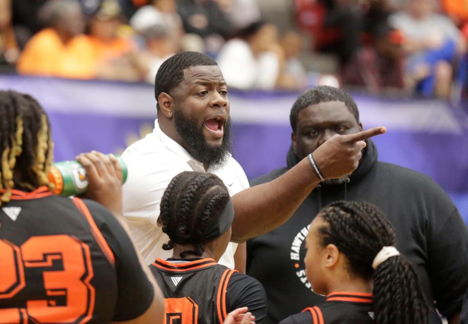 Coach Cornelius Ingram points to a player in the fourth quarter as they mounted a come behind win Hawthorne Hs Hornets vs the Graceville Tigers at the FHSAA Girls 1A Championship at the RP Funding Center in Lakeland Fl. Saturday March 2nd 2024, 2024 Photo by Calvin Knight