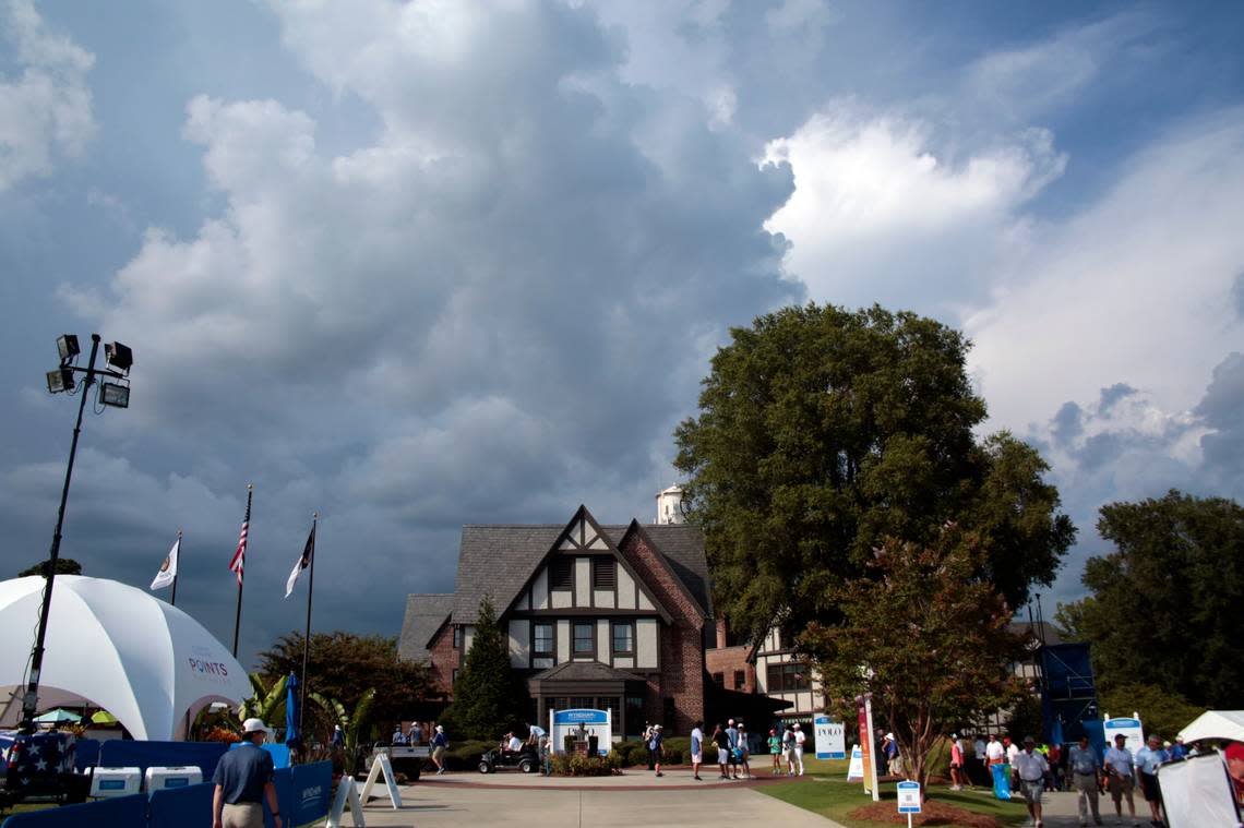 Thunderstorm clouds brought lightning, causing a weather delay, later in the day during the first round at the Wyndham Championship golf tournament at Sedgefield Country Club in Greensboro, N.C. on Thursday, August 12, 2021. (AP Photo/Chris Seward)