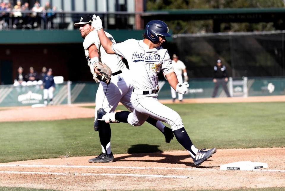 Cal Poly first baseman Joe Yorke (55) just misses the tag on UC Irvine’s Chase Call (26) in the Mustangs’ 9-7 loss to UC Irvine in a Big West Conference baseball game at Baggett Stadium, San Luis Obispo on March 25, 2023.
