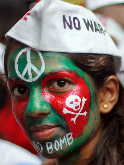 A student with a painted face participates in a peace rally to commemorate the 67th anniversary of the atomic bombings of the Japanese cities of Hiroshima and Nagasaki, in Mumbai August 6, 2012. REUTERS/Danish Siddiqui