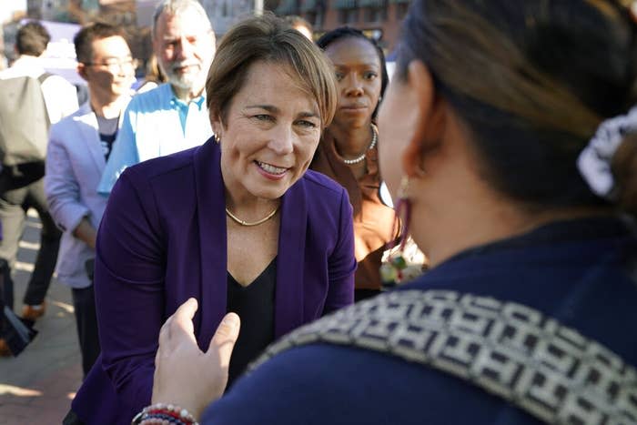 Maura Healey greets people during a campaign stop, Nov. 7, 2022.