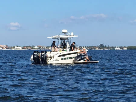 A crew from the Pasco Sheriff's office work at the scene of a plane crash where retired Major League Baseball pitcher Roy Halladay died, in New Port Richey, Florida, in this social media photo obtained November 7, 2017. Pasco Sheriff's Office/Social media/Handout via REUTERS