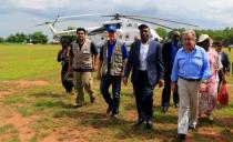 UN Secretary General Antonio Guterres (R) and Uganda's Prime Minister Ruhakana Rugunda (C) arrive at Imvepi, where south Sudanese refugees are settled, in northern Uganda June 22, 2017. REUTERS/James Akena