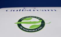 A decal stating "This Aircraft Flies On Renewable Fuel" is seen on on a Gulfstream 650ER business jet at the National Business Aviation Association (NBAA) exhibition in Las Vegas