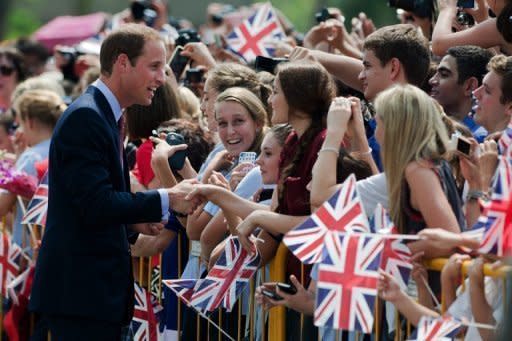 Prince William greets fans at Singapore's Gardens by the Bay on September 12. The couple will later head to Malaysia, where they will tour the capital Kuala Lumpur and Borneo island's Sabah state from September 13-15