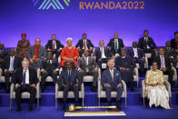 Front row from left; British Prime Minister Boris Johnson, Rwandan President Paul Kagame, Britain's Prince Charles and Secretary-General of the Commonwealth of Nations Patricia Scotland attend the opening ceremony of the Commonwealth Heads of Government Meeting (CHOGM) on Friday, June 24, 2022 in Kigali, Rwanda. Leaders of Commonwealth nations are meeting in Rwanda Friday in a summit that promises to tackle climate change, tropical diseases and other challenges deepened by the COVID-19 pandemic. (Dan Kitwood/Pool Photo via AP)