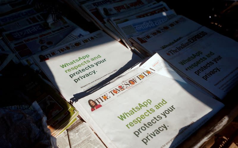 FILE PHOTO: A WhatsApp advertisement is seen on the front pages of newspapers at a stall in Mumbai