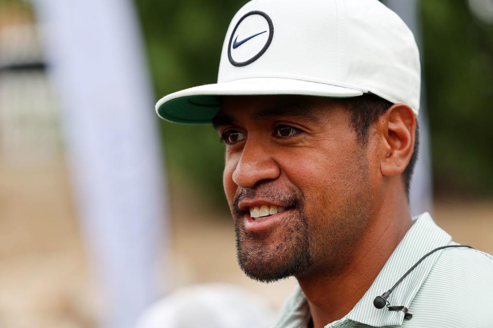 Professional golfer Tony Finau smiles as he and other golfers demonstrate golf strokes during the Tony Finau Foundation Golf Classic in Farmington on Monday, Aug. 1, 2022. A Utah appellate court recently tossed out one of two lawsuits filed against Finau. | Scott G Winterton, Deseret News