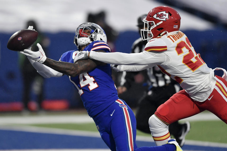 Kansas City Chiefs' Juan Thornhill, right, breaks up a pass intended for Buffalo Bills' Stefon Diggs. (AP Photo/Adrian Kraus)