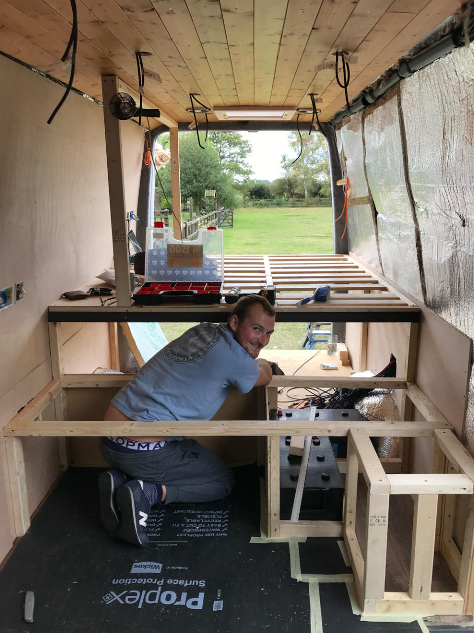 Kieran working hard on converting their first van in 2019 (Collect/PA Real Life)