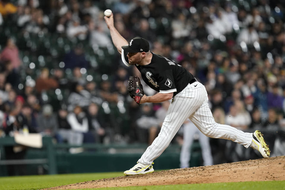 Chicago White Sox relief pitcher Liam Hendriks delivers during the ninth inning of the team's baseball game against the Los Angeles Dodgers on Tuesday, June 7, 2022, in Chicago. The White Sox won 4-0. (AP Photo/Charles Rex Arbogast)