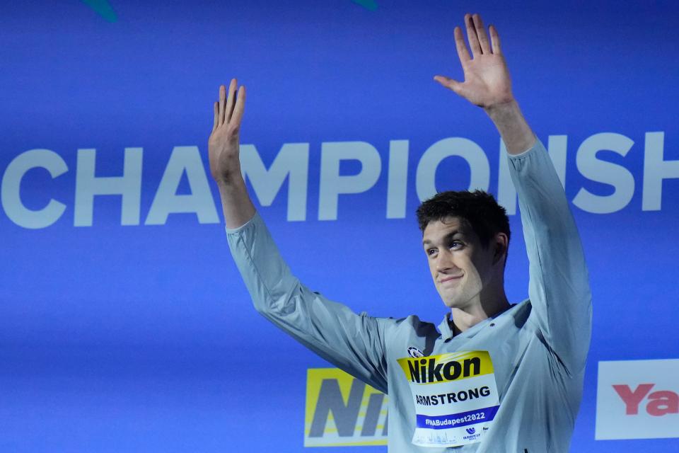 Hunter Armstrong of the United States celebrates after the men's 50-meter backstroke final at the 19th FINA World Championships in Budapest, Hungary, Saturday, June 25, 2022.