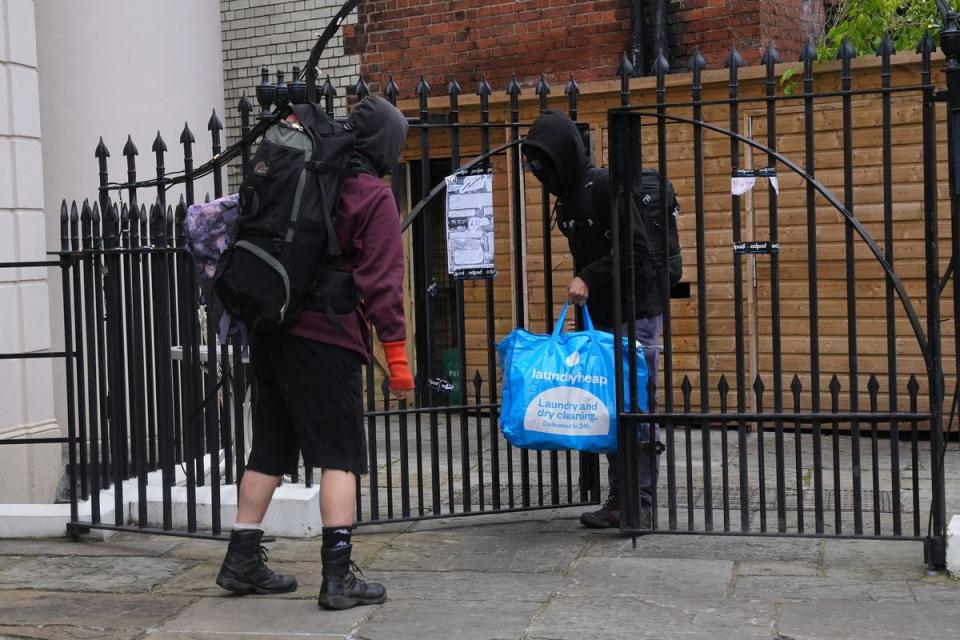 Squatters leaving the York & Albany pub in Regent’s Park (Lucy North/PA Wire)