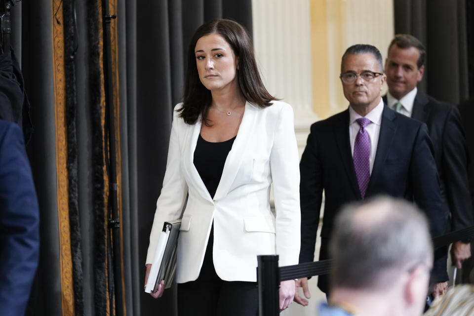 Cassidy Hutchinson, former aide to Trump White House chief of staff Mark Meadows, arrives to testify as the House select committee investigating the Jan. 6 attack on the U.S. Capitol holds a hearing at the Capitol in Washington, Tuesday, June 28, 2022. (AP Photo/J. Scott Applewhite)