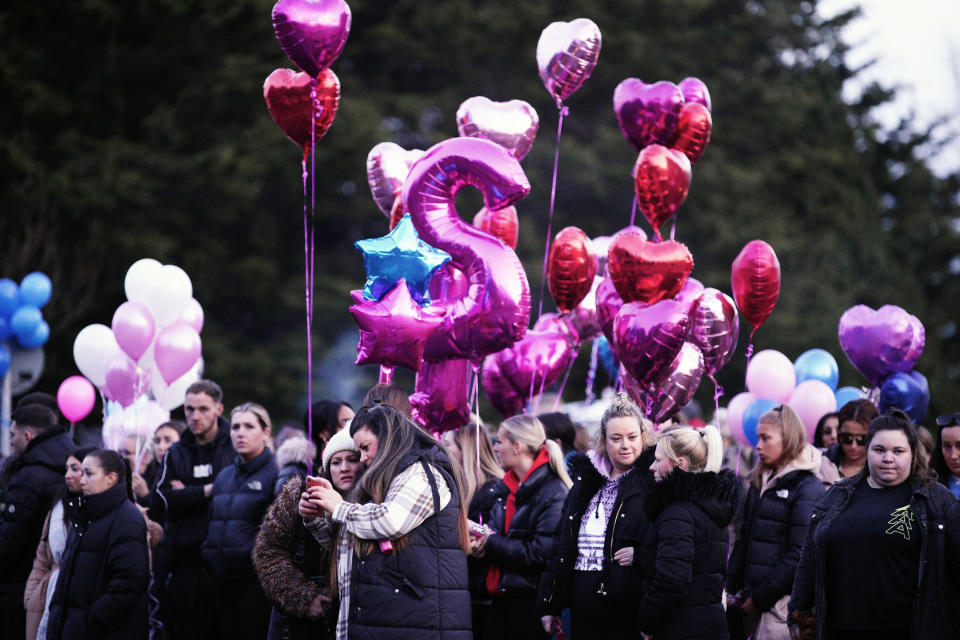 People attend a vigil in the St Mellons area of Cardiff, in memory of Eve Smith, 21, Darcy Ross, 21, and Rafel Jeanne, 24, who died in a road traffic accident, while Sophie Russon, 20, and Shane Loughlin, 32, survived but remain in a critical condition. Picture date: Tuesday March 7, 2023. (Photo by Ben Birchall/PA Images via Getty Images)