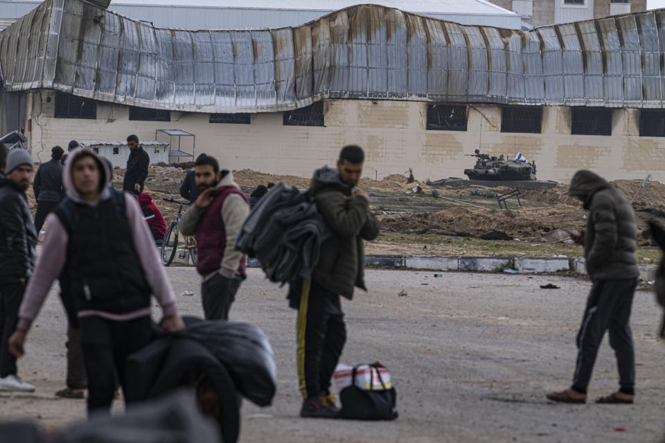 Palestinians flee Israeli ground offensive in Kahn Younis, Gaza Strip, Saturday, Jan. 27, 2024. (AP Photo/Fatima Shbair)