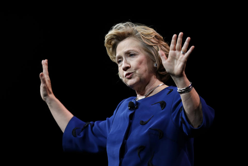 Former Secretary of State Hillary Rodham Clinton gestures while delivering the keynote address at Marketo’s 2014 Marketing Nation Summit Tuesday, April 8, 2014, in San Francisco. (AP Photo/Ben Margot)