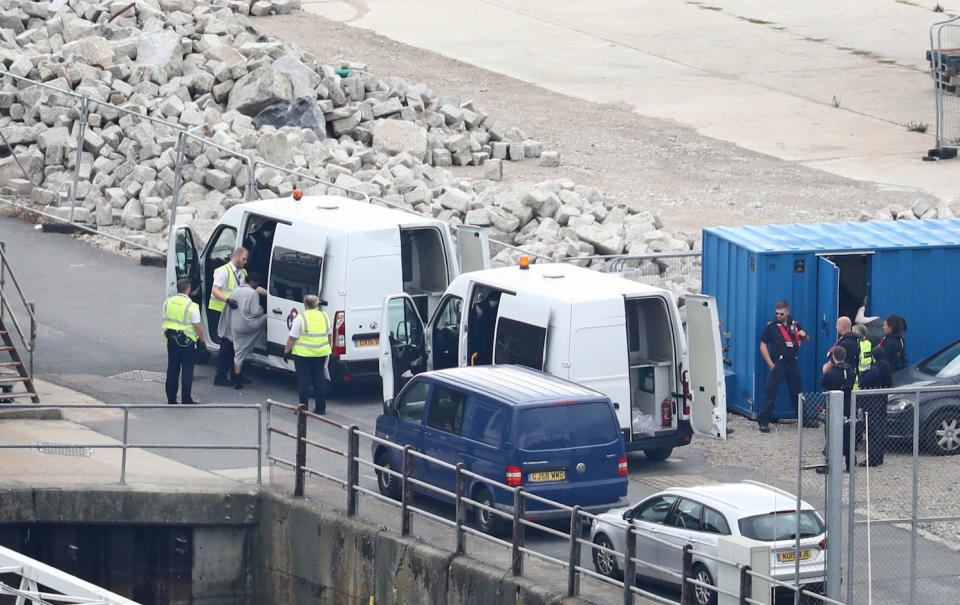 A group of people thought to be migrants are brought to shore by Border Force officers at the Port of Dover on Monday (Picture: PA)