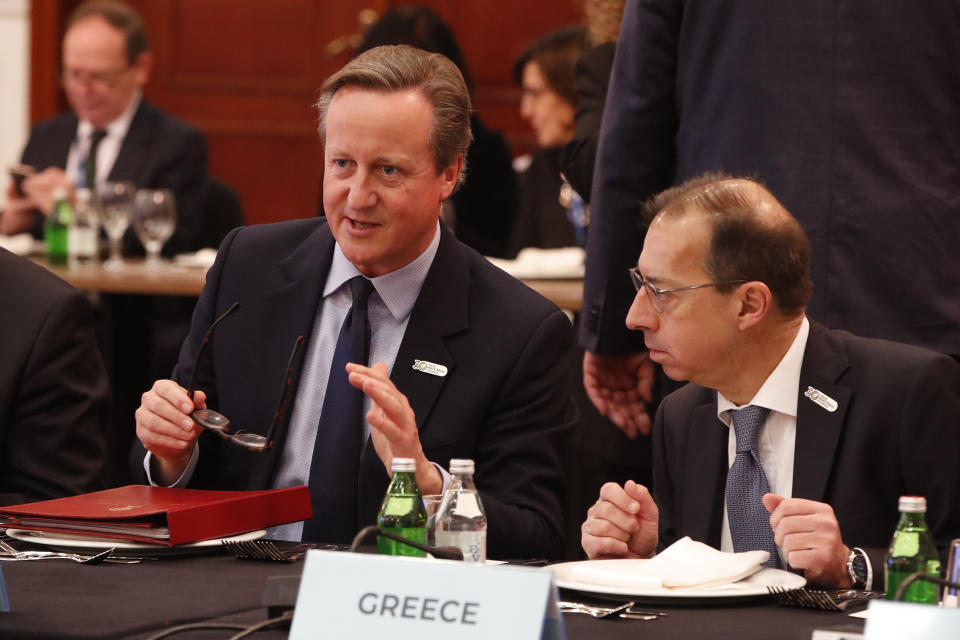 British Foreign Secretary David Cameron, left, attends a meeting with foreign ministers and officials of OSCE (Organization for Security and Co-operation in Europe) member countries in Skopje, North Macedonia, on Wednesday, Nov. 29, 2023. (AP Photo/Boris Grdanoski)
