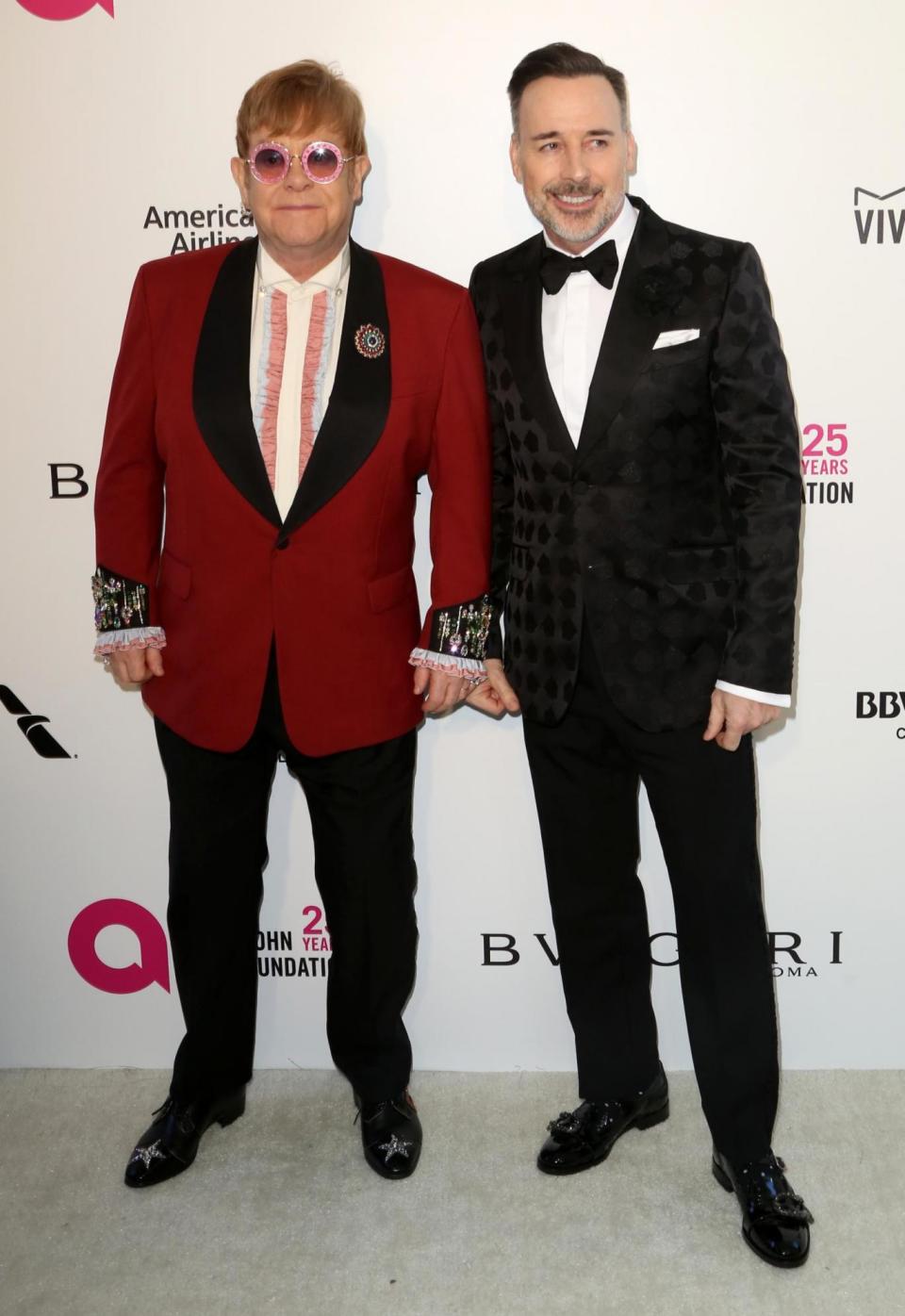 Dream Duo: Sir Elton and his husband David Furnish at their annual Oscars after-party earlier this year(Willy Sanjuan/Invision/AP)