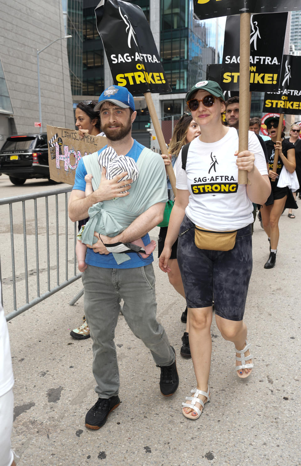 NEW YORK, NEW YORK – JULY 21: Daniel Radcliffe and Erin Darke join the picket line In New York City on in New York City. Photo by John Nacion/Getty Images