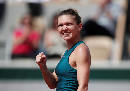 Tennis - French Open - Roland Garros, Paris, France - June 6, 2018 Romania's Simona Halep celebrates winning her quarter final match against Germany's Angelique Kerber REUTERS/Benoit Tessier