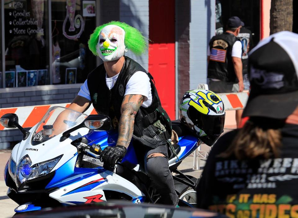 Biketoberfest along Main Street in Daytona Beach usually takes on the Halloween spirit, like this biker in 2022.