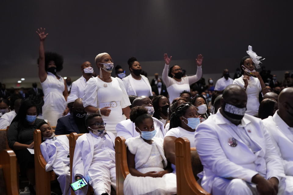 Family members react during the funeral service for George Floyd at the Fountain of Praise Church in Houston on Tuesday. (David J. Phillip/AP/Pool)