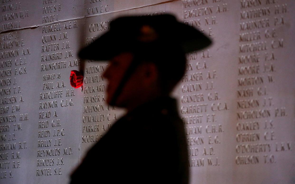 An Australian soldier attends the dawn service at the Australian National Memorial in Villers-Bretonneux, France, April 25, 2018 - REUTERS