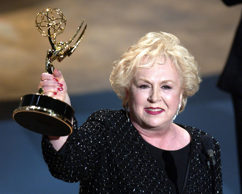 <p>Doris Roberts started acting in film and television in 1951, but most of America knew her as the meddling matriarch on Everybody Loves Raymond. She died on April 17 at age 90. — (Pictured) Doris Roberts accepts her award for Best Supporting Actress in a Comedy Series during the 53rd Annual Primetime Emmy Awards. (M. Caulfield/WireImage) </p>