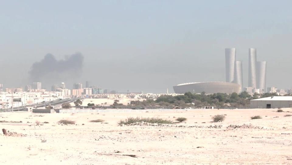 Footage shows the roof of a building ablaze near the fan village called Qetaifan Island North