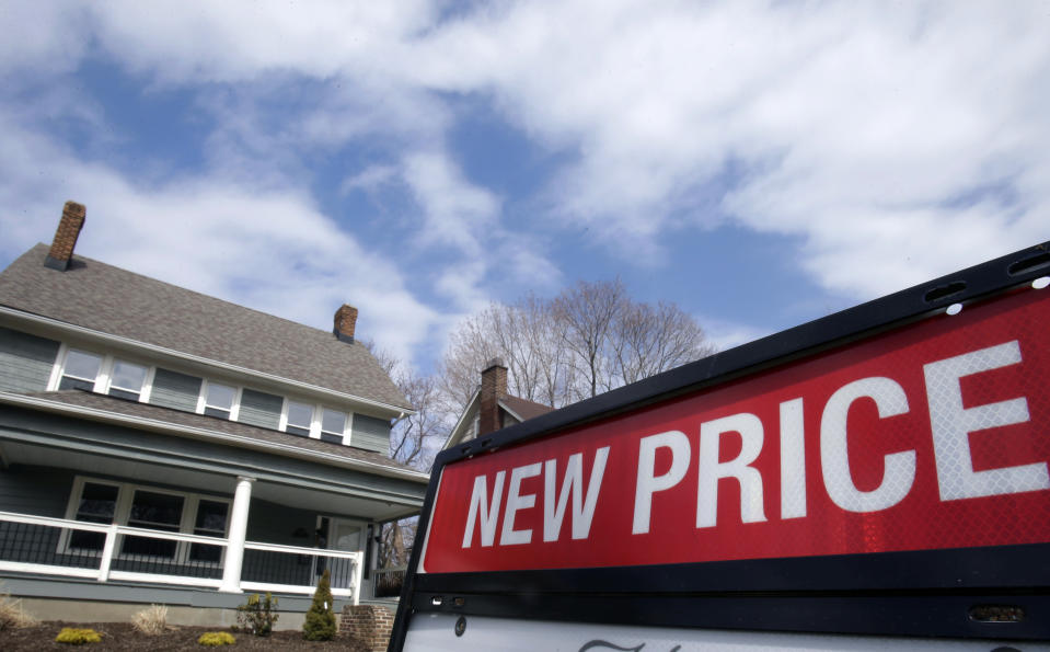 This Friday, March 21, 2014, photo, shows a home for sale in Cleveland Heights, Ohio. Entering the 2014 spring buying season, the U.S. housing market faces an unusual dilemma: Too few people are selling homes. Yet too few buyers can afford the homes that are for sale. A 13.4 percent jump in the average price of a home sold last year, according to the Standard & Poor's/Case-Shiller 20-city index, hasn’t managed to coax more homeowners to sell. And combined with higher mortgage rates, higher prices have made homes costlier for first-time buyers as well as for all-cash investors. (AP Photo/Tony Dejak, File)