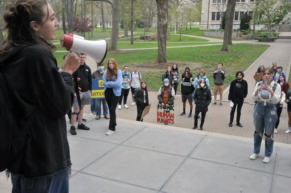 Veda Massanari speaks to the approximately 150 people at a Roe v. Wade demonstration Thursday on the College of Wooster campus.