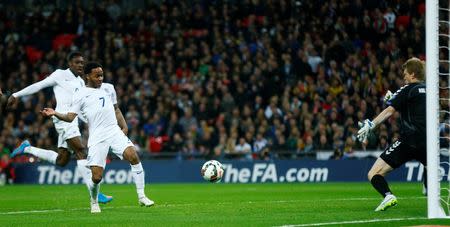 Football - England v Lithuania - UEFA Euro 2016 Qualifying Group E - Wembley Stadium, London, England - 27/3/15 England's Raheem Sterling scores their third goal Reuters / Eddie Keogh Livepic