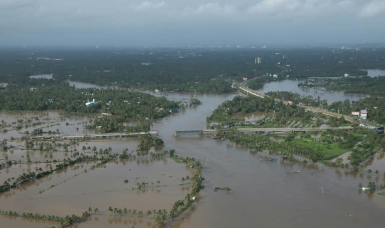 thousands remain trapped in towns and villages cut off by the floods amid growing shortages of food and water