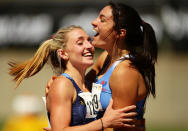 SYDNEY, AUSTRALIA - MARCH 16: Michelle Jenneke (R) of NSW celebrates with 2nd placegetter Abble Taddeo (L) of NSW after winning the Womens U20 100m Hurdles Final during day three of the Australian Junior Athletics Championships at Sydney Olympic Park Athletic Centre on March 16, 2012 in Sydney, Australia. (Photo by Matt King/Getty Images)