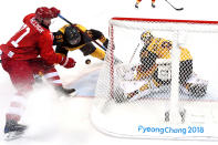 <p>Ilya Kovalchuk #71 of Olympic Athlete from Russia attempts a shot against Danny Aus Den Birken #33 of Germany in the third period during the Men’s Gold Medal Game on day sixteen of the PyeongChang 2018 Winter Olympic Games at Gangneung Hockey Centre on February 25, 2018 in Gangneung, South Korea. (Photo by Bruce Bennett/Getty Images) </p>