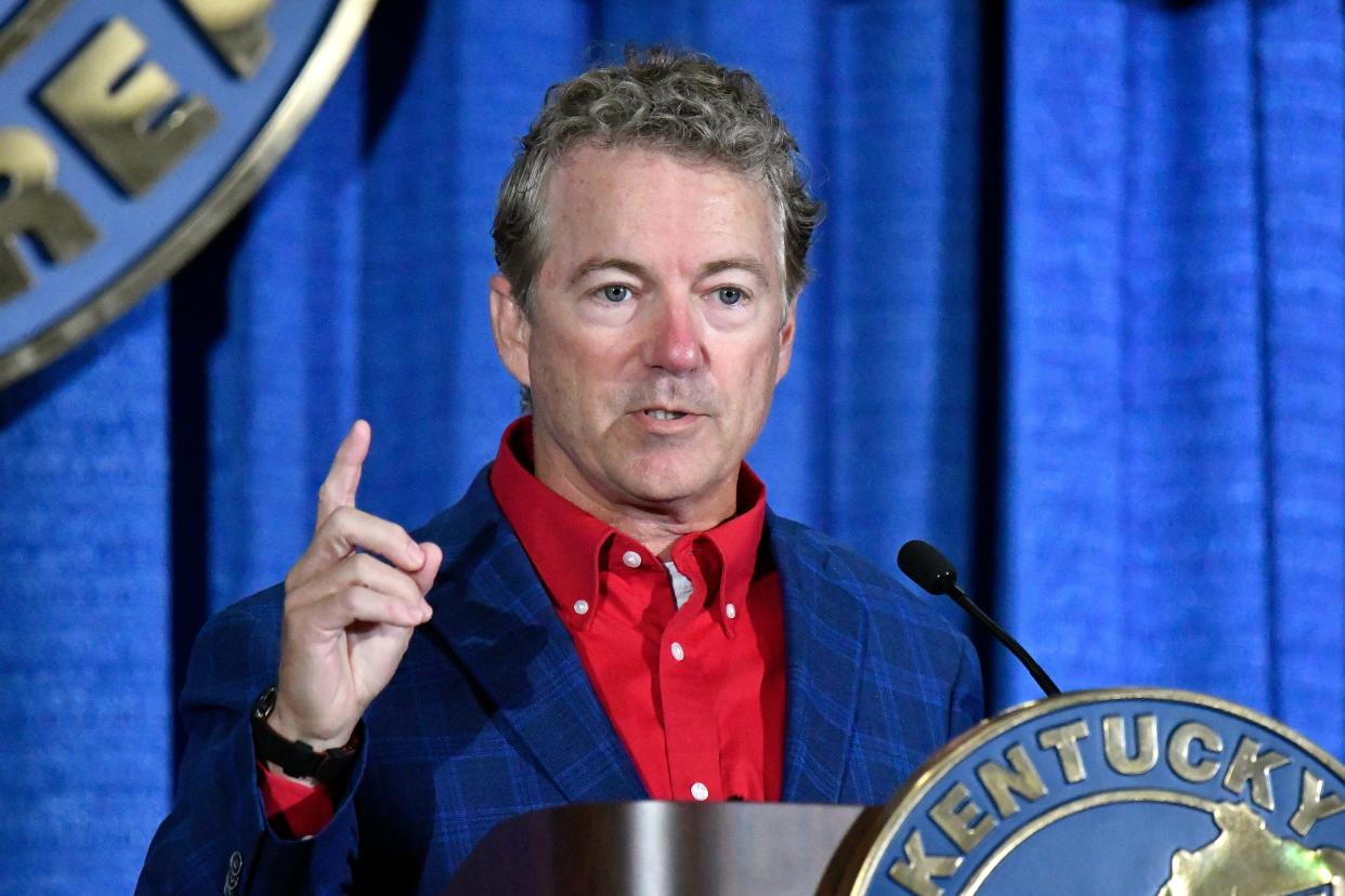Republican Sen. Rand Paul, of Ky., addresses the audience at the Kentucky Farm Bureau Ham Breakfast at the Kentucky State Fair in Louisville, Ky., Aug. 25, 2022. Paul was the victim of a 2017 attack when his neighbor slammed into him outside his Kentucky home. Earlier that year, Paul took cover when a gunman opened fire while GOP members of Congress practiced for a charity baseball game. Now, Paul has falsely conflated those events with his opponent, Democrat Charles Booker, in his re-election bid.