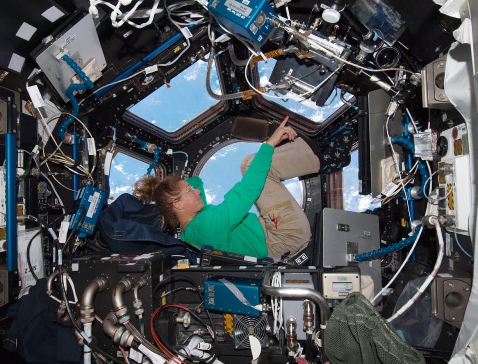 <div class="inline-image__caption"><p>NASA astronaut Sandy Magnus mission specialist for space shuttle Atlantis STS-135, takes in the view while sitting in the Cupola addition of the International Space Station July 16, 2011 in space.</p></div> <div class="inline-image__credit">NASA via Getty</div>