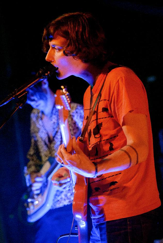 Bradford Cox, left, and Lockett Pundt sing and play guitar along with other members of the indie rock group Deerhunter, perform at One Eyed Jack's in the French Quarter in New Orleans, Monday, April 29, 2013. (AP Photo/Matthew Hinton)