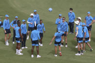 South Africa's cricket team plays with a soccer ball during a practice session at the National Cricket Stadium, in Karachi, Pakistan, Saturday, Jan. 23, 2021. South Africa, which arrived in the southern port city of Karachi for the first time in nearly 14 years, will play the first test match against Pakistan starting on Jan. 26. (AP Photo/Fareed Khan)