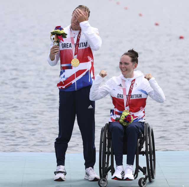 ParalympicsGB rowers Lauren Rowles and, Laurence Whiteley win gold in the PR2 mixed double sculls in Tokyo