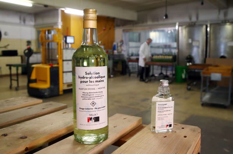 Bottles of pear and mint alcohol is pictured at Swiss distiller Morand in Martigny