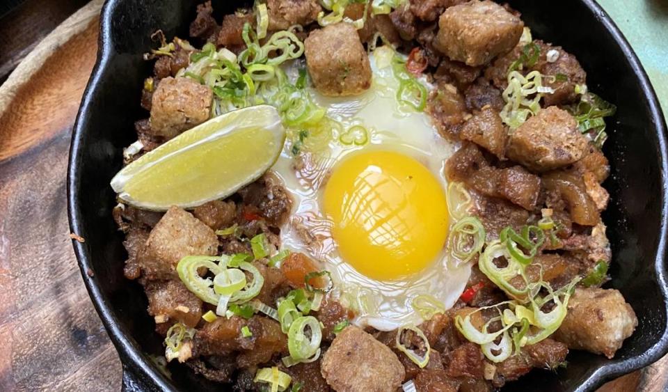 Sisig is one of the Filipino specialties you will find at Jeepney in 1-800-Lucky.