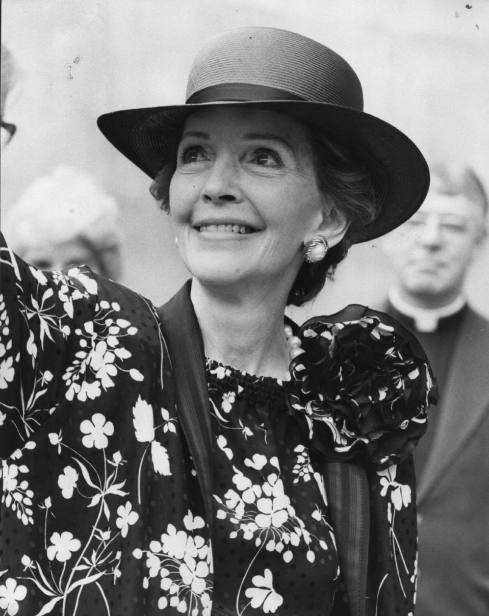 Nancy Reagan in a floral dress and fedora in London